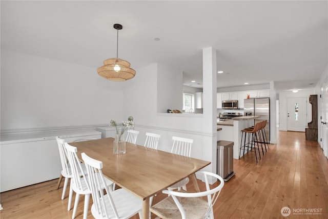 1344 Foreman Rd, Dupont, WA 98327 - dining room featuring light wood finished floors and recessed lighting