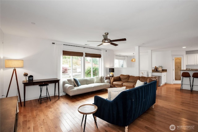 1344 Foreman Rd, Dupont, WA 98327 - living area with ceiling fan and light wood-style flooring