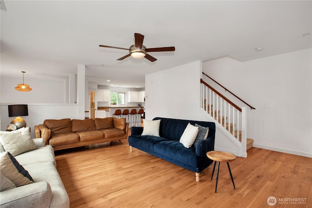 1344 Foreman Rd, Dupont, WA 98327 - living area featuring ceiling fan, light wood finished floors, stairs, and recessed lighting