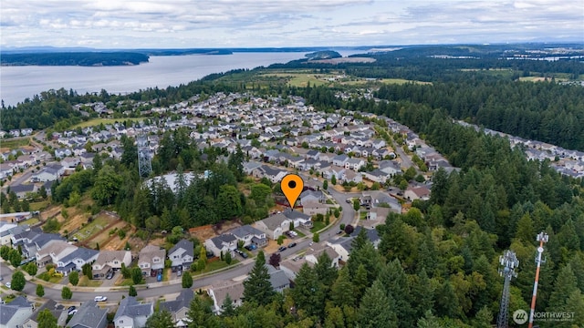 1344 Foreman Rd, Dupont, WA 98327 - aerial view of property and surrounding area with nearby suburban area and a nearby body of water