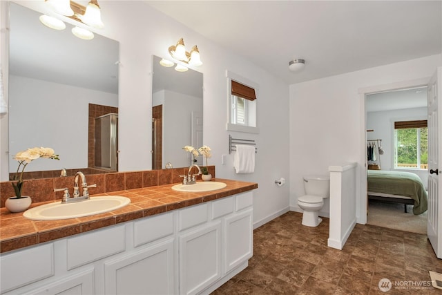 1344 Foreman Rd, Dupont, WA 98327 - ensuite bathroom featuring double vanity and a stall shower