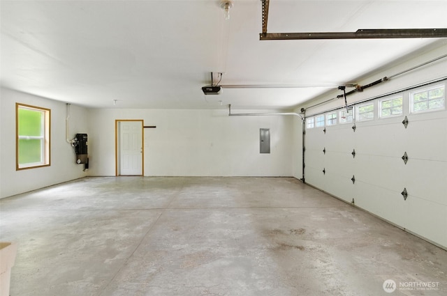 442 Rhododendron Dr, Sequim, WA 98382 - garage featuring electric panel and a garage door opener