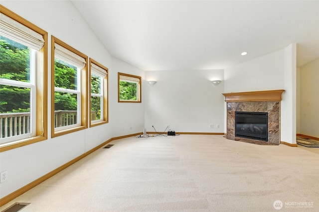 442 Rhododendron Dr, Sequim, WA 98382 - unfurnished living room featuring carpet flooring and a high end fireplace