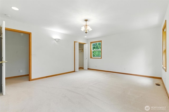 442 Rhododendron Dr, Sequim, WA 98382 - carpeted spare room featuring a smoke detector, a chandelier, and recessed lighting