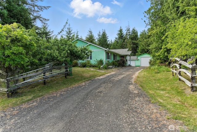 442 Rhododendron Dr, Sequim, WA 98382 - single story home with driveway, a detached garage, and an outdoor structure