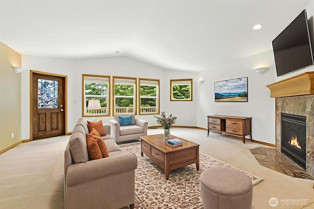 442 Rhododendron Dr, Sequim, WA 98382 - living room with light carpet, lofted ceiling, and a fireplace
