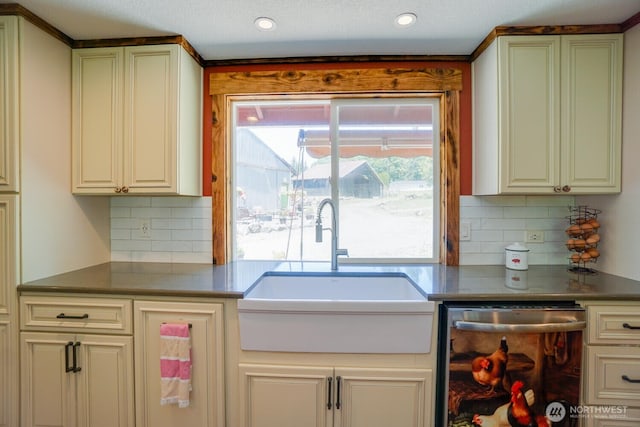 19910 NE 356th St, Yacolt, WA 98675 - kitchen featuring dishwasher, tasteful backsplash, dark countertops, and recessed lighting