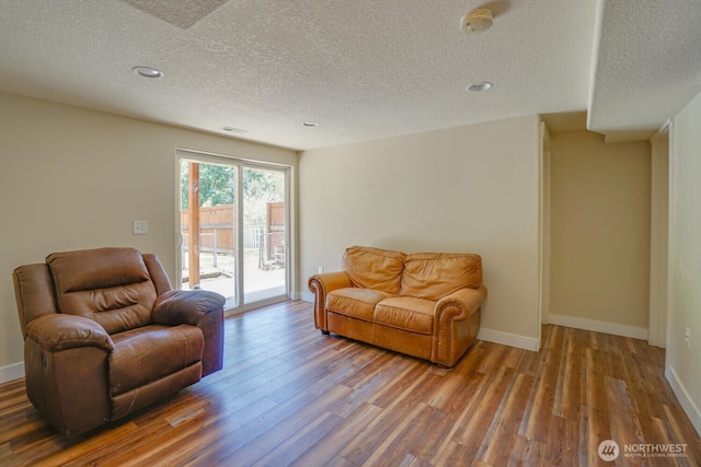 19910 NE 356th St, Yacolt, WA 98675 - living room featuring a textured ceiling, wood finished floors, and recessed lighting