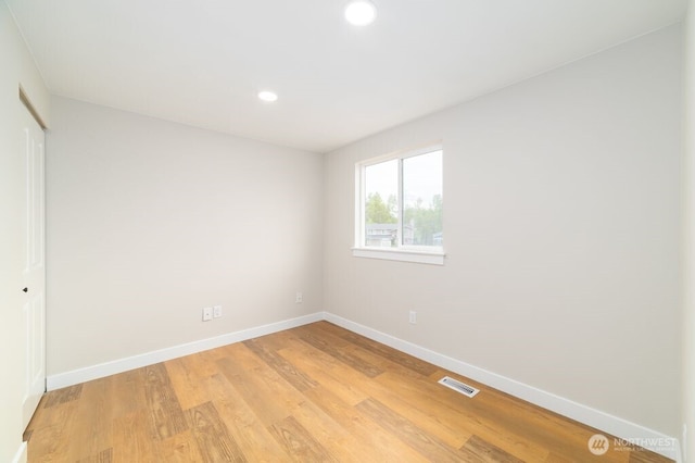 2316 67th Ave NE, Tacoma, WA 98422 - unfurnished bedroom with light wood-type flooring, recessed lighting, and a closet
