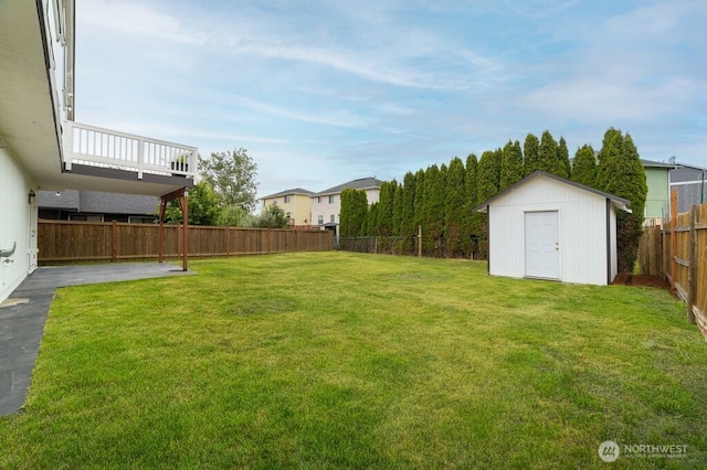 2316 67th Ave NE, Tacoma, WA 98422 - fenced backyard featuring a shed and a patio