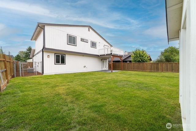 2316 67th Ave NE, Tacoma, WA 98422 - rear view of property with a fenced backyard and a gate