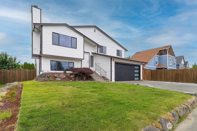 2316 67th Ave NE, Tacoma, WA 98422 - view of front facade featuring concrete driveway and a chimney