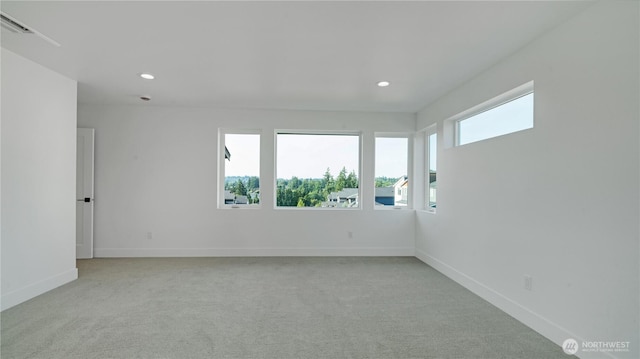 1225 S 234th Dr, Des Moines, WA 98198 - unfurnished room featuring light colored carpet and recessed lighting
