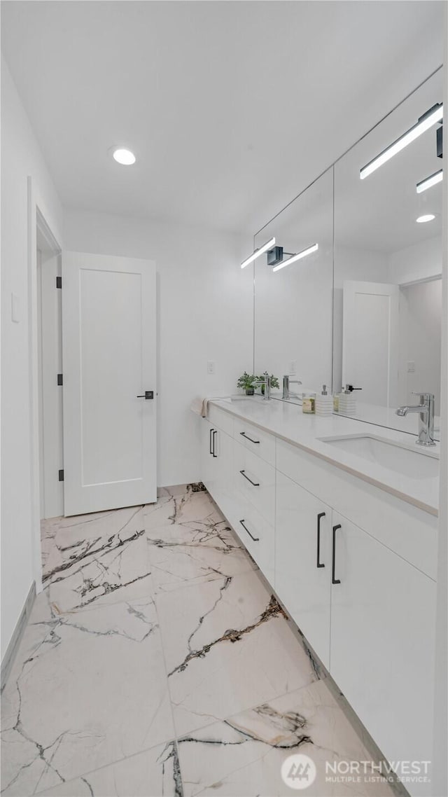 1225 S 234th Dr, Des Moines, WA 98198 - full bath featuring double vanity, recessed lighting, and marble finish floors