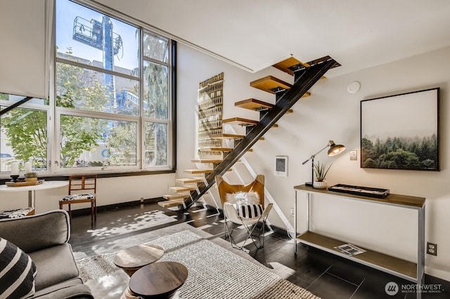 1000 Union St Unit 215, Seattle, WA 98101 - living area featuring stairs and tile patterned flooring