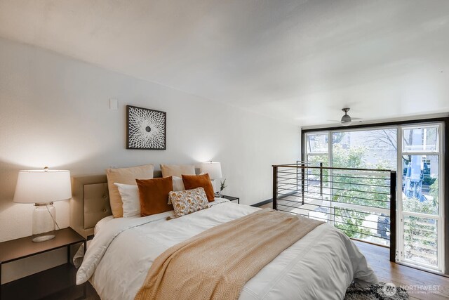 1000 Union St Unit 215, Seattle, WA 98101 - bedroom featuring wood finished floors, access to exterior, and ceiling fan
