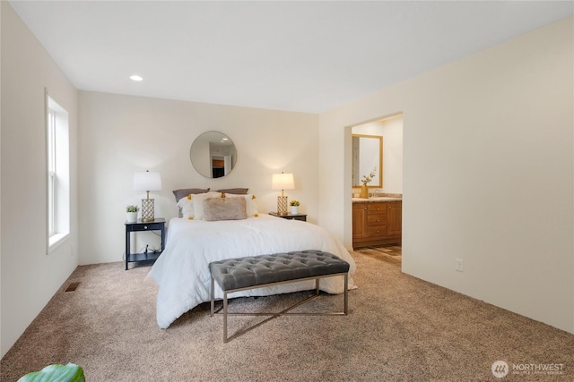 15807 78th Avenue Ct E, Puyallup, WA 98375 - bedroom with light carpet, ensuite bath, and recessed lighting
