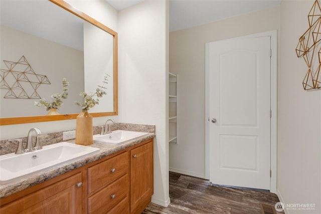 15807 78th Avenue Ct E, Puyallup, WA 98375 - full bathroom featuring double vanity and wood finished floors