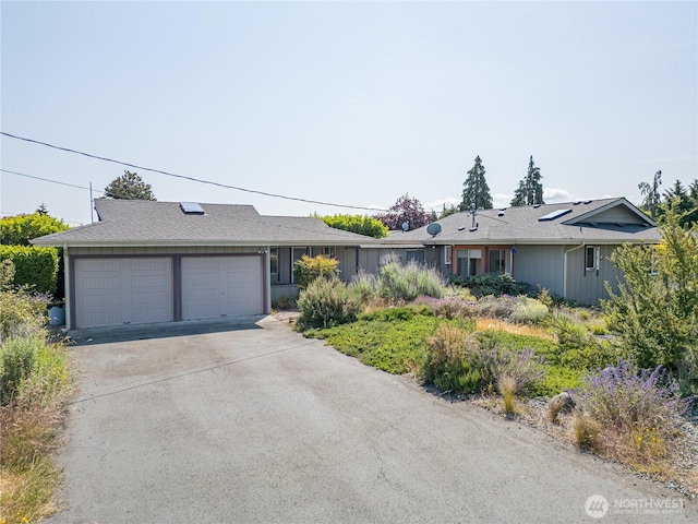 702 E Alder, Sequim, WA 98382 - ranch-style home with a garage and concrete driveway