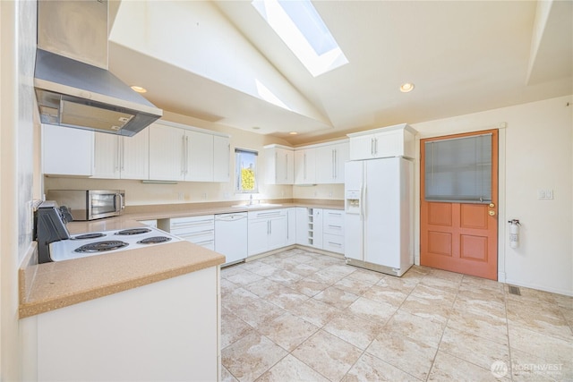 702 E Alder, Sequim, WA 98382 - kitchen featuring white appliances, range hood, a skylight, lofted ceiling, and light countertops
