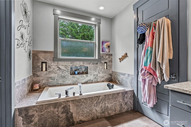 140 Bowers, Chehalis, WA 98532 - full bath with a garden tub, vanity, and tile patterned floors