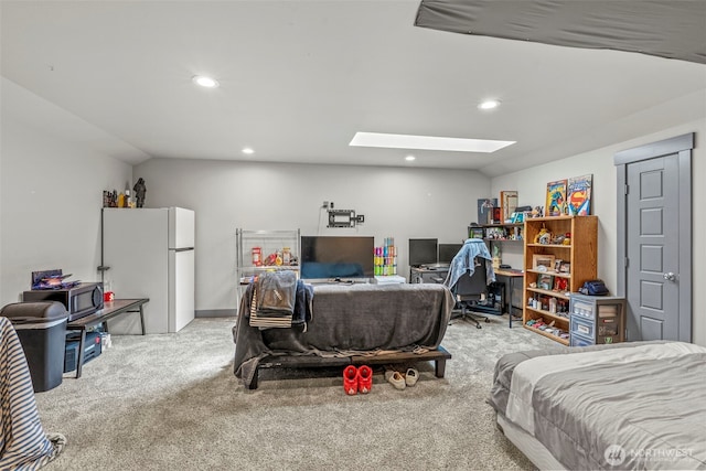140 Bowers, Chehalis, WA 98532 - bedroom featuring light colored carpet, a skylight, recessed lighting, freestanding refrigerator, and an office area
