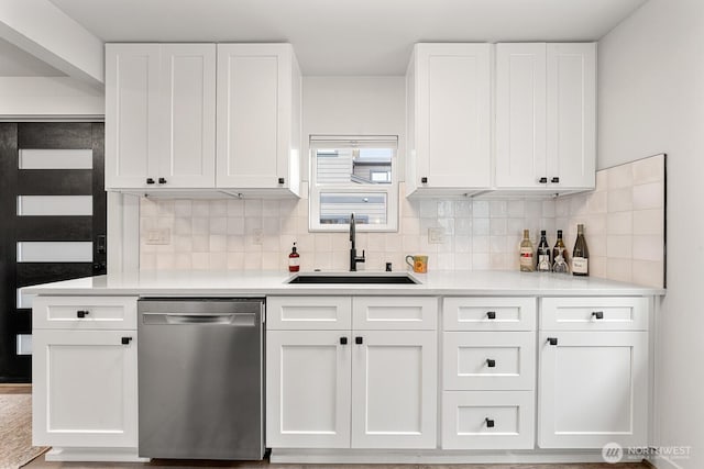 102 NW 132nd St, Seattle, WA 98177 - kitchen featuring dishwasher, white cabinets, light countertops, and decorative backsplash