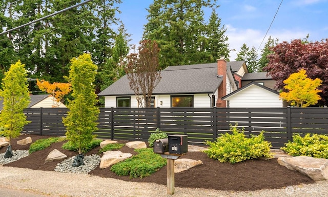 102 NW 132nd St, Seattle, WA 98177 - rear view of property featuring roof with shingles and a chimney