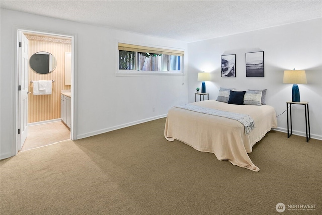 4444 44th Ave SW Unit 101, Seattle, WA 98116 - carpeted bedroom featuring connected bathroom and a textured ceiling