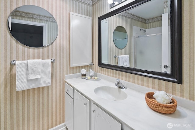 4444 44th Ave SW Unit 101, Seattle, WA 98116 - full bath with an enclosed shower, wallpapered walls, and vanity