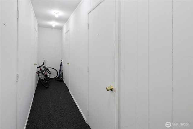 4444 44th Ave SW Unit 101, Seattle, WA 98116 - hallway featuring baseboards and carpet