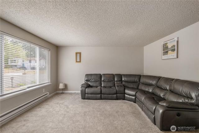 1513 154th St E, Tacoma, WA 98445 - living area with a baseboard heating unit, light colored carpet, and a textured ceiling