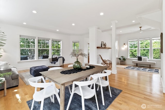 1615 Monroe St, Bellingham, WA 98225 - dining area with light wood finished floors, recessed lighting, decorative columns, and ceiling fan