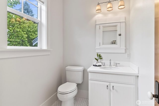 1615 Monroe St, Bellingham, WA 98225 - half bathroom featuring vanity and tile patterned flooring