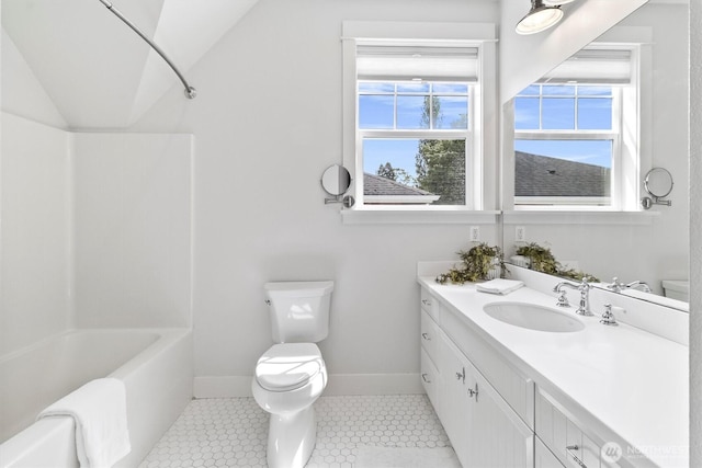 1615 Monroe St, Bellingham, WA 98225 - full bath with vanity, shower / bath combination, vaulted ceiling, and tile patterned floors