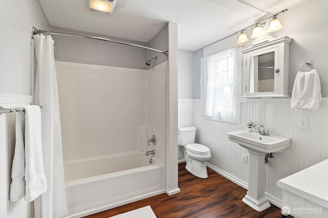 1615 Monroe St, Bellingham, WA 98225 - bathroom with shower / bath combination with curtain, wainscoting, and wood finished floors