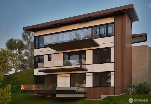 1017 California Ln SW, Seattle, WA 98116 - rear view of house featuring stucco siding and a balcony