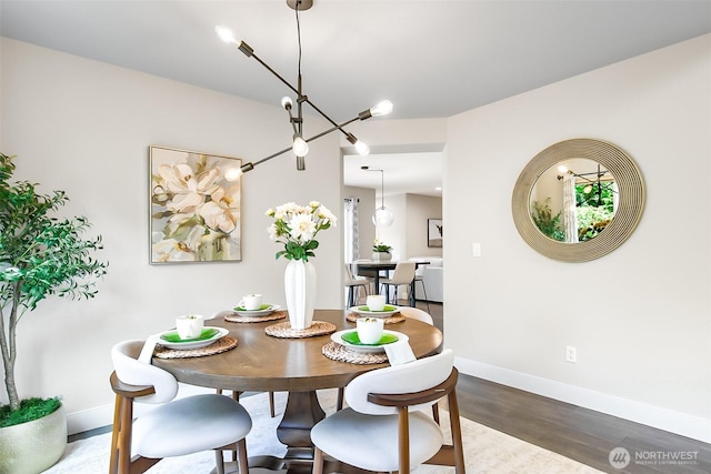 3906 141st Pl SE, Mill Creek, WA 98012 - dining space featuring baseboards and dark wood-style flooring