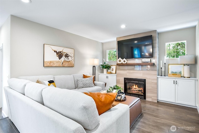 3906 141st Pl SE, Mill Creek, WA 98012 - living room with a tile fireplace, dark wood finished floors, healthy amount of natural light, and recessed lighting