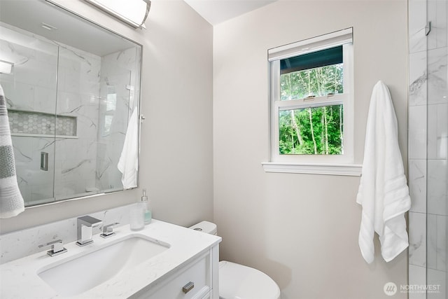 3906 141st Pl SE, Mill Creek, WA 98012 - bathroom featuring vanity and a marble finish shower