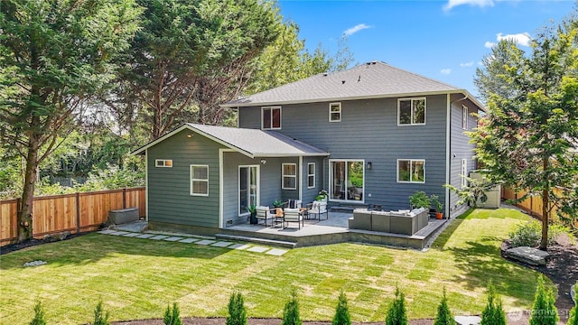 3906 141st Pl SE, Mill Creek, WA 98012 - back of property with an outdoor hangout area, a fenced backyard, and a patio