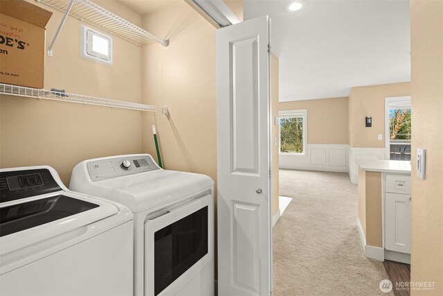 1957 23rd Pl NE Unit 201, Issaquah, WA 98029 - washroom featuring washer and clothes dryer, carpet floors, recessed lighting, and a wainscoted wall
