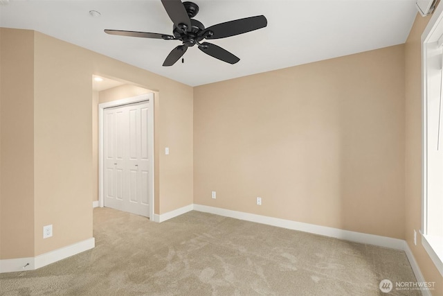 1957 23rd Pl NE Unit 201, Issaquah, WA 98029 - carpeted empty room with a ceiling fan and baseboards