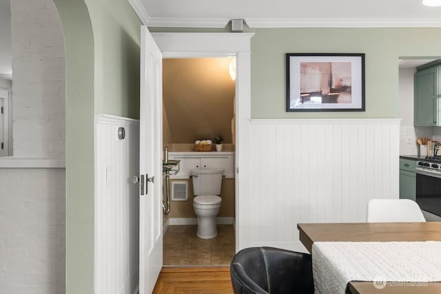 4055 SW Prince St, Seattle, WA 98116 - bathroom with wainscoting and ornamental molding