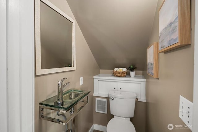 4055 SW Prince St, Seattle, WA 98116 - half bathroom with vaulted ceiling and a sink