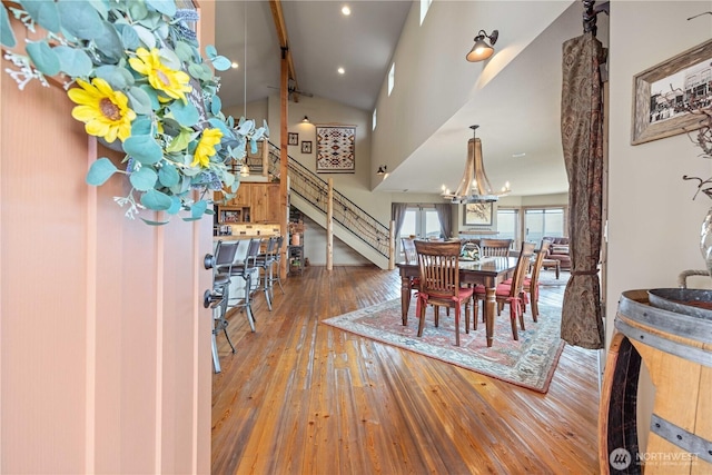 95 Horizon Ln, Chelan, WA 98816 - dining space featuring stairs, hardwood / wood-style flooring, and a chandelier