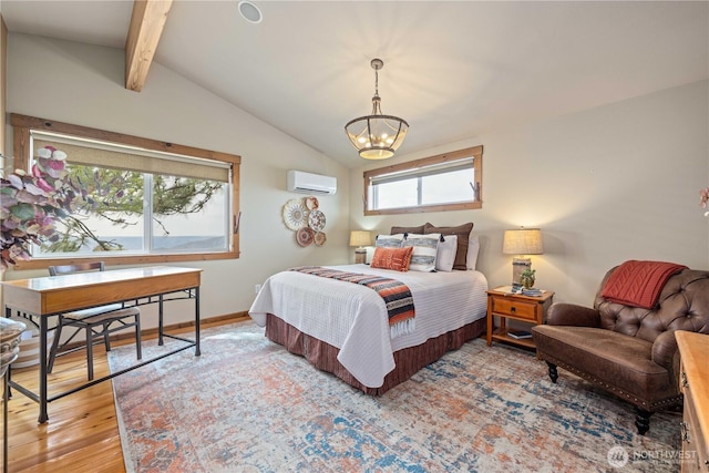 95 Horizon Ln, Chelan, WA 98816 - bedroom featuring a wall mounted AC, a chandelier, and wood finished floors