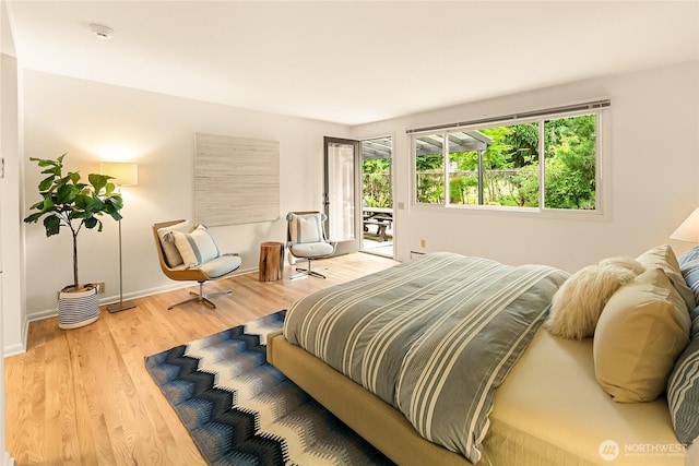 2325 38th Ave E, Seattle, WA 98112 - bedroom featuring access to outside and wood finished floors