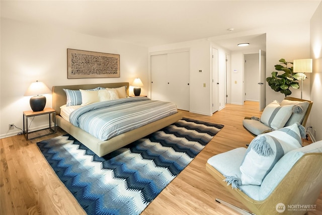 2325 38th Ave E, Seattle, WA 98112 - bedroom with wood finished floors and a closet