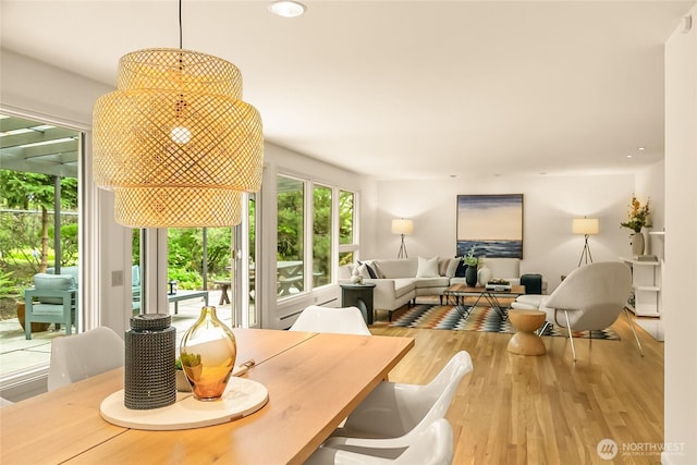 2325 38th Ave E, Seattle, WA 98112 - dining room with wood finished floors and recessed lighting